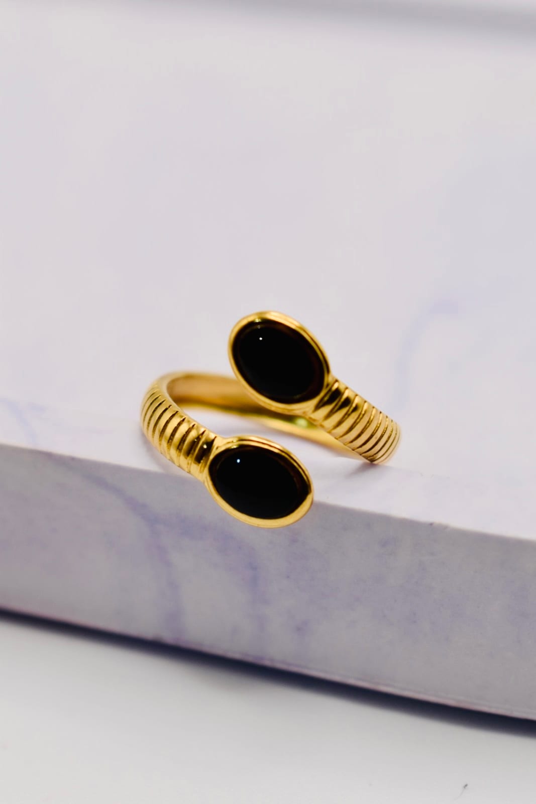 Gold Puffer Ring with Black Stones