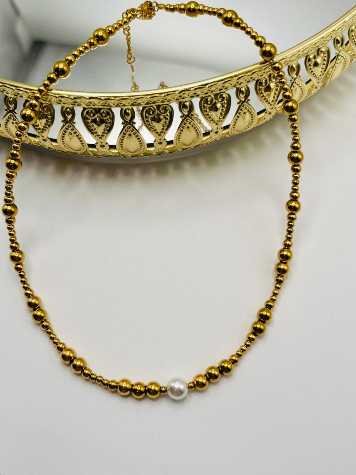 Gold Necklace with Metallic Beads and White Pearl Center