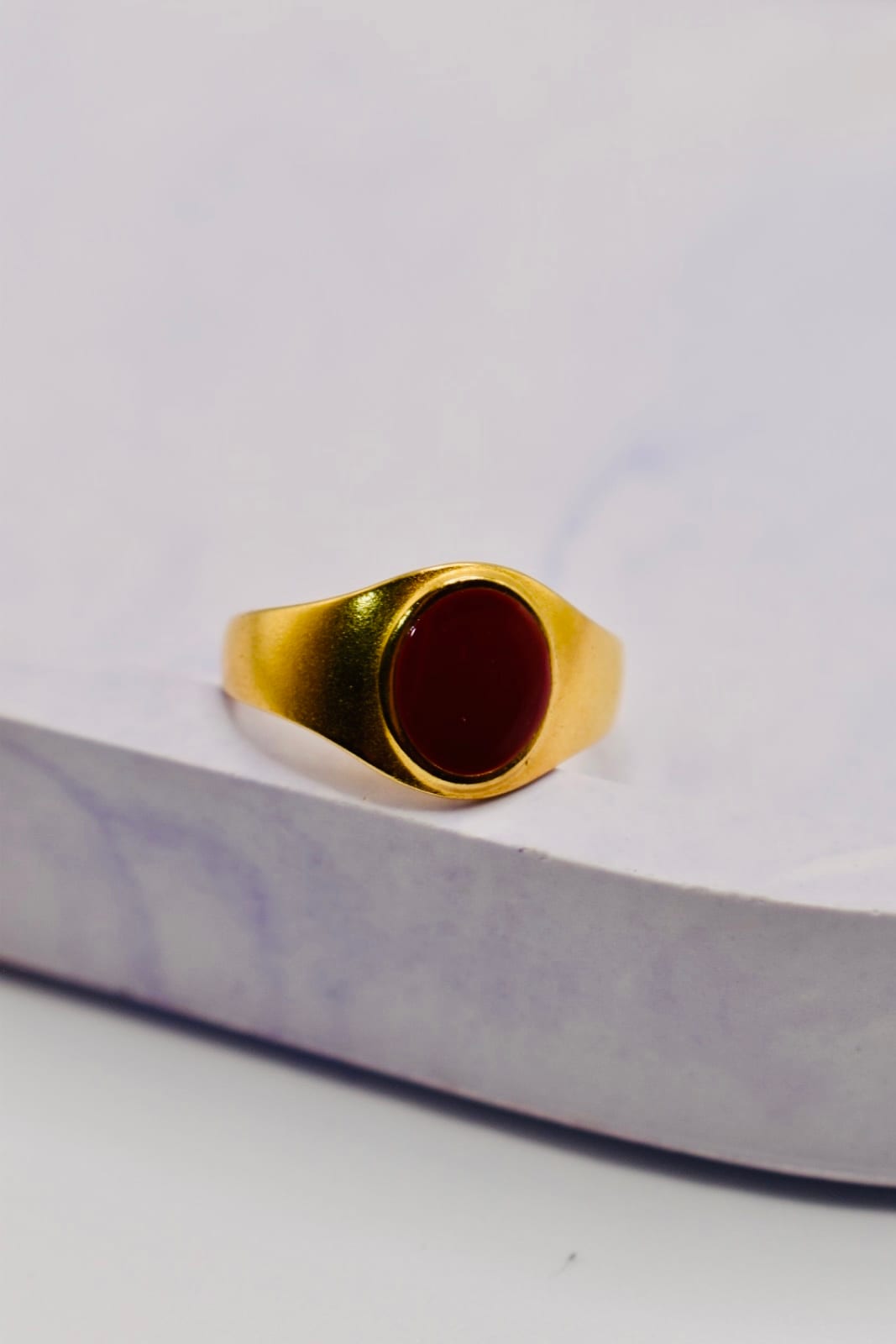 Gold Ring with Red Circular Accent